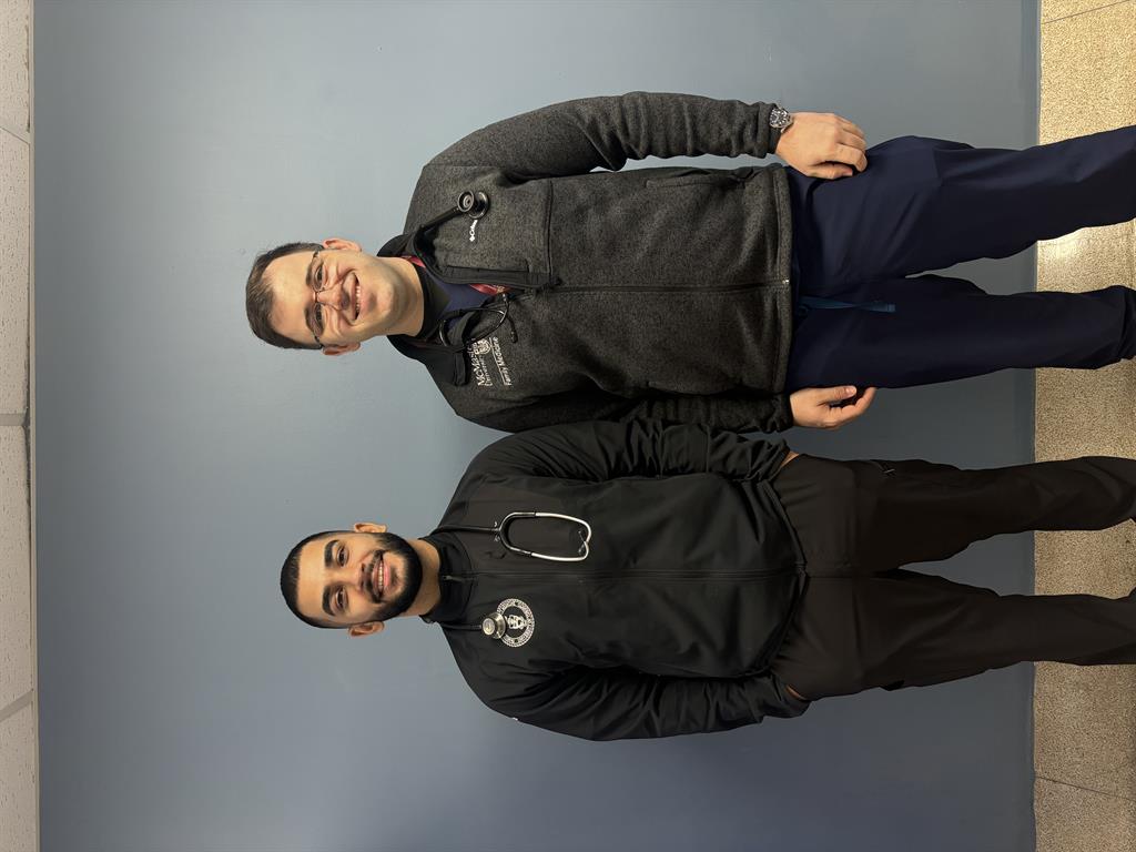 resident physicians (left to right) Bartosz Zawada and Karanbir Sandhu